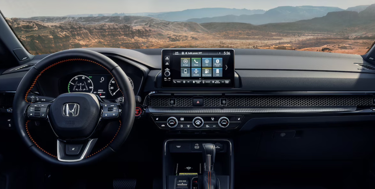 La cabina del CR-V Hybrid tiene tecnologia sobresaliente para mantenerte informado y conectado en cada viaje.