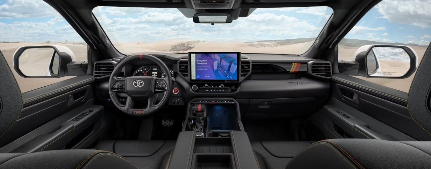The black interior of a 2025 Toyota Tundra TRD Rally.