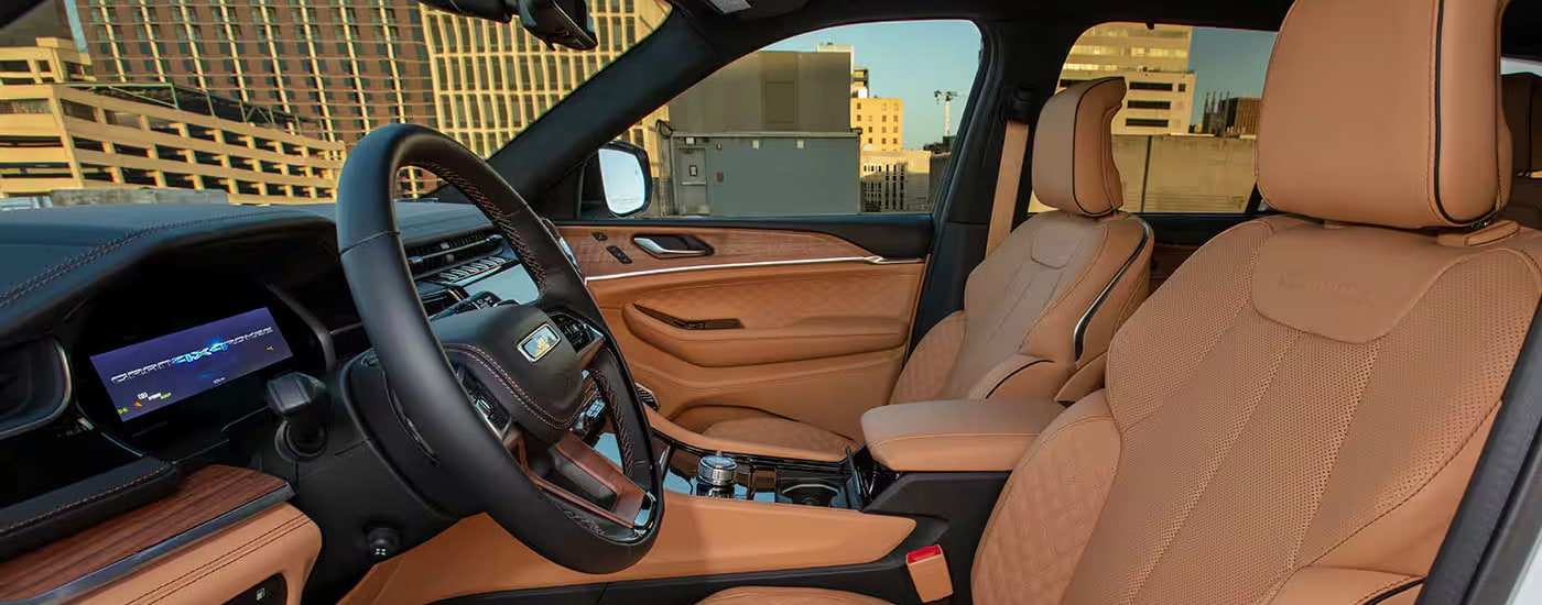 Brown leather upholstery in a 2024 Jeep Grand Cherokee Summit 4xe at a Jeep dealer near Brookshire.