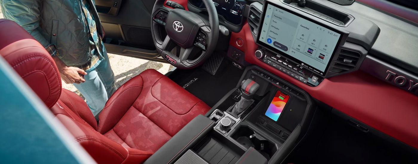 Overhead view of the red leather cabin of a 2024 Toyota Tundra for sale near Austin.