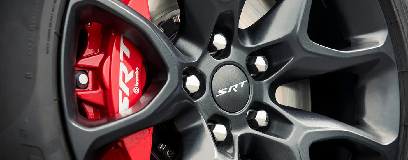 A close up of the grey rim and tire on a 2024 Dodge Durango.