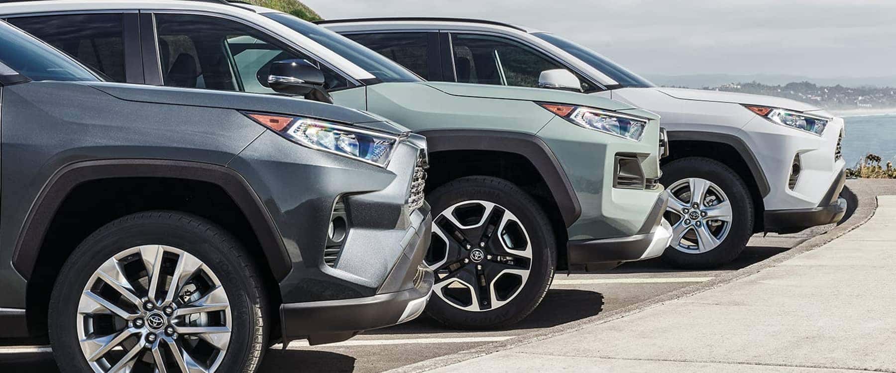 Three 2021 Toyota RAV4s parked