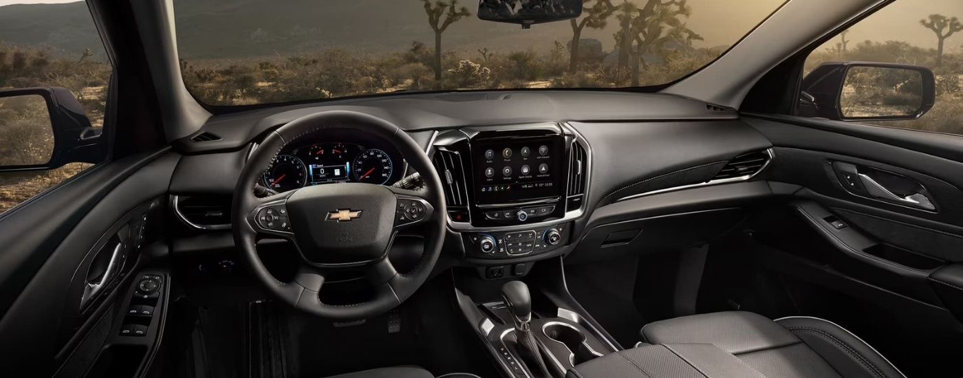 he black interior is shown in a 2023 Chevy Traverse.