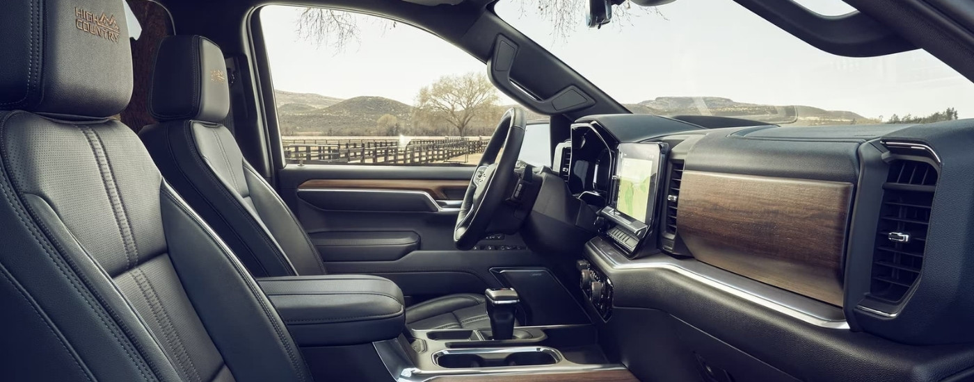 Side view of the brown leather interior of a 2024 Chevy Silverado 1500 for sale.