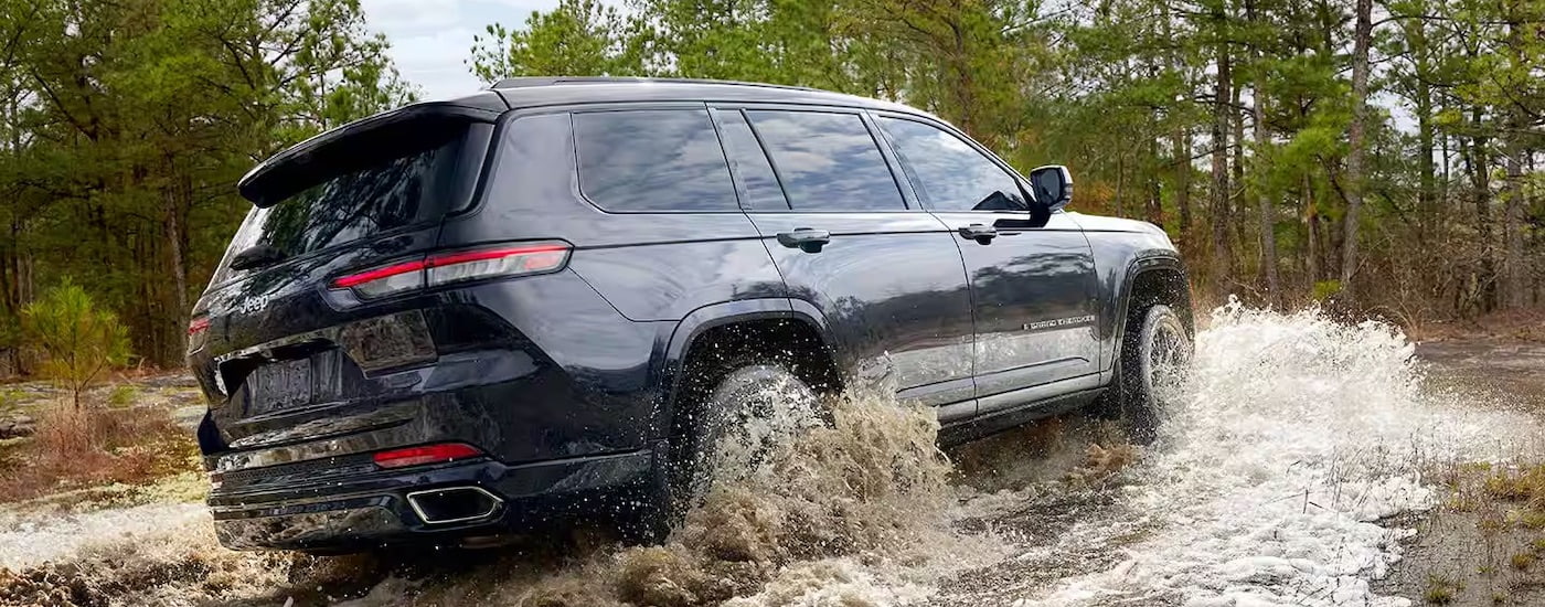 A dark blue 2025 Jeep Grand Cherokee for sale near Katy.