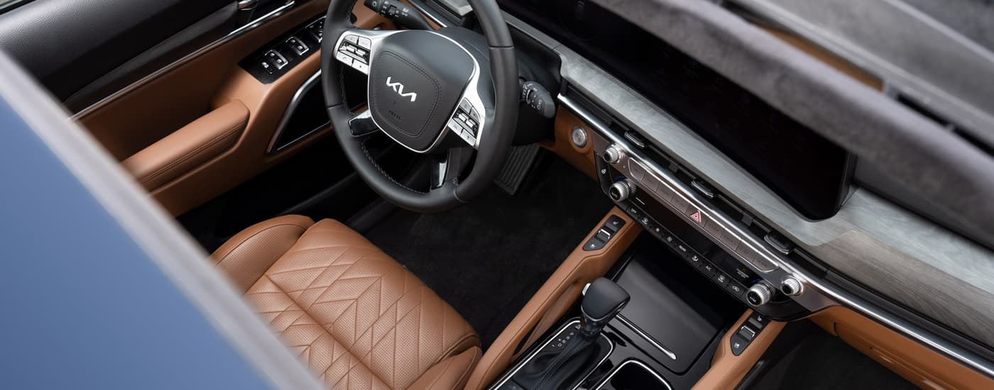 The tan and black interior of a 2025 Kia Telluride X-Pro for sale.
