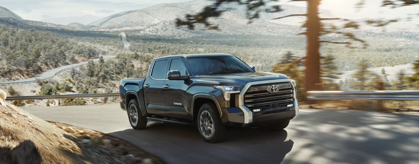 A grey 2024 Toyota Tundra is shown from the front at an angle.