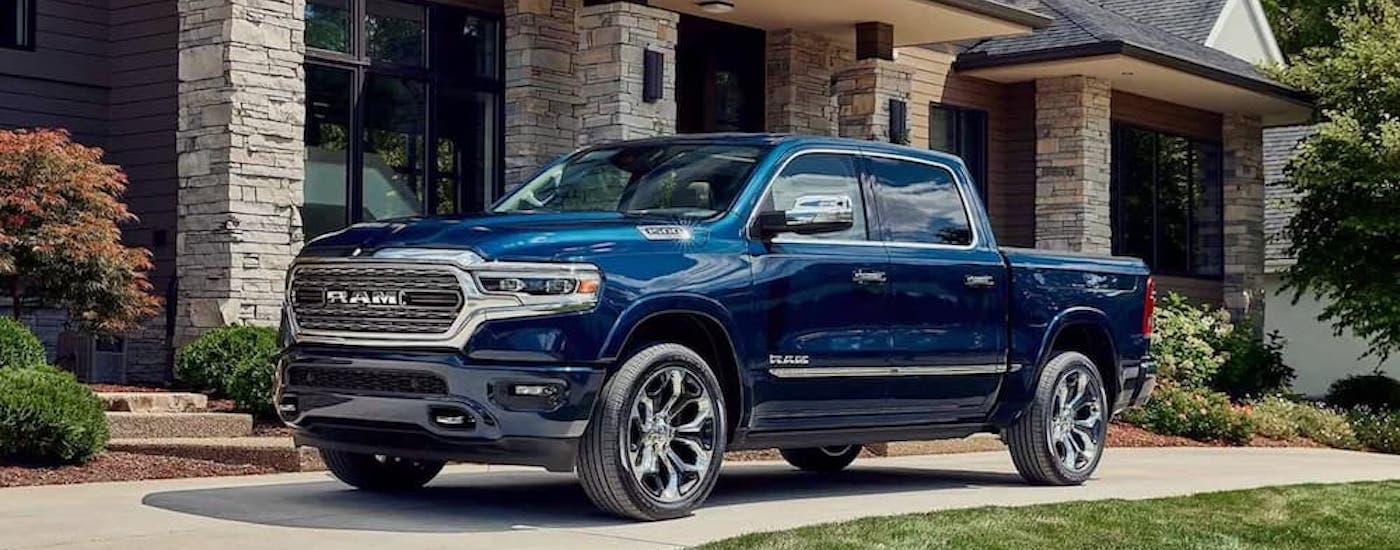 A blue 2023 used Ram 1500 for sale near Cypress.