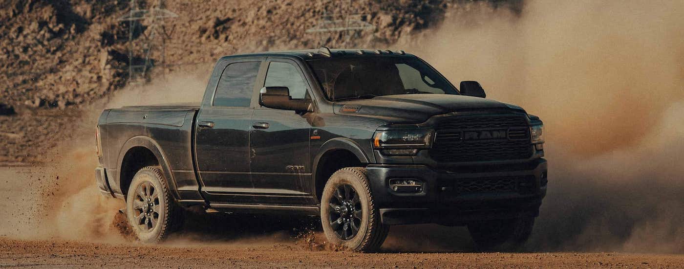 A black 2022 Ram 2500 off-roading.