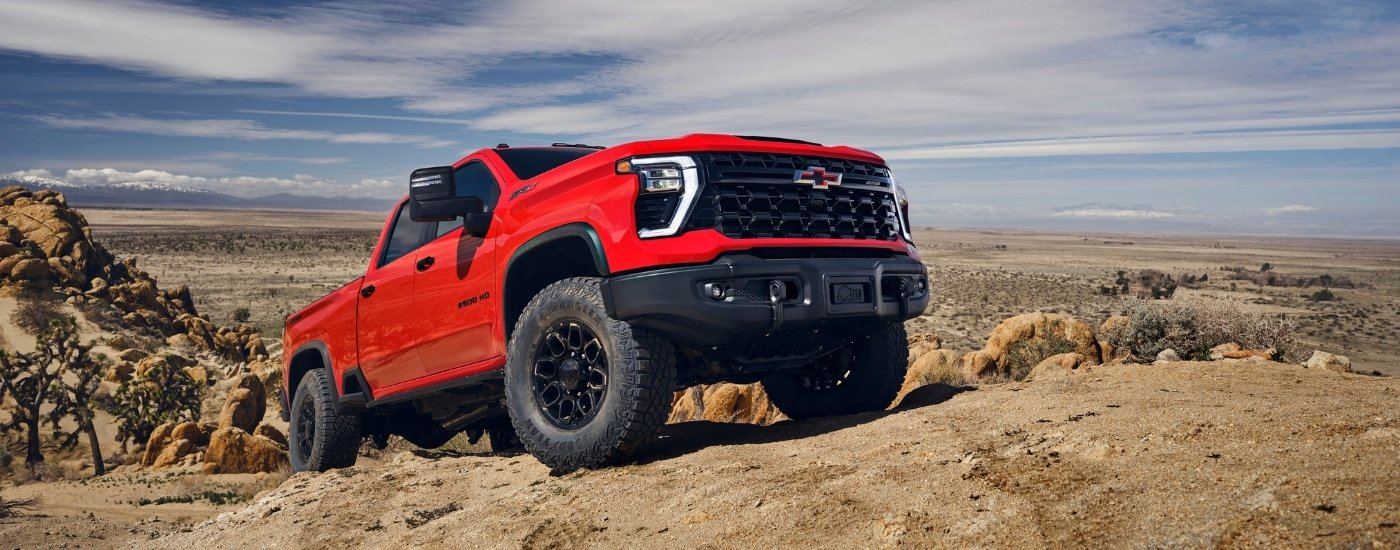 A red 2025 Chevy Silverado 2500 for sale near Houston.