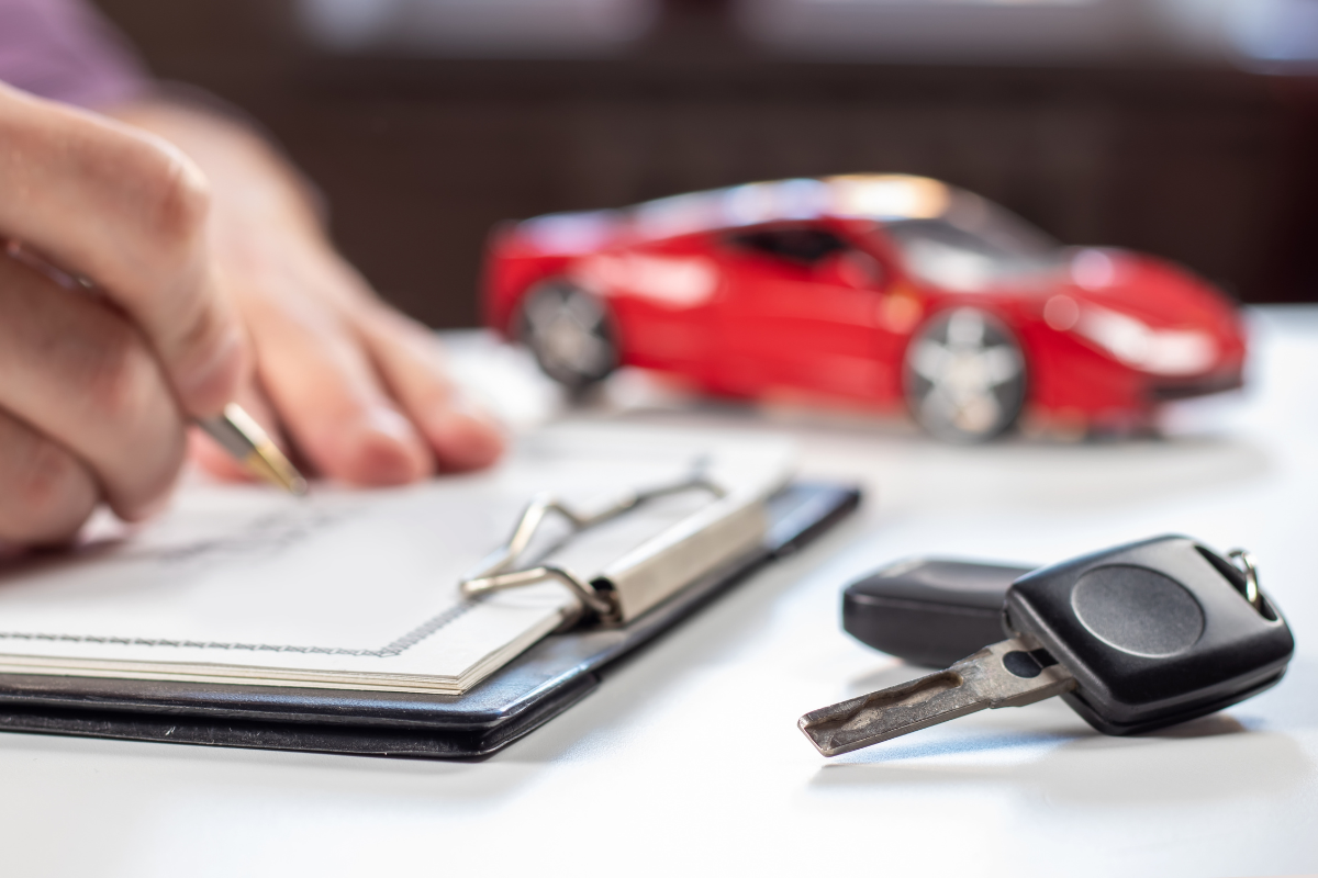 Customer signing financing paperwork for their next Honda vehicle