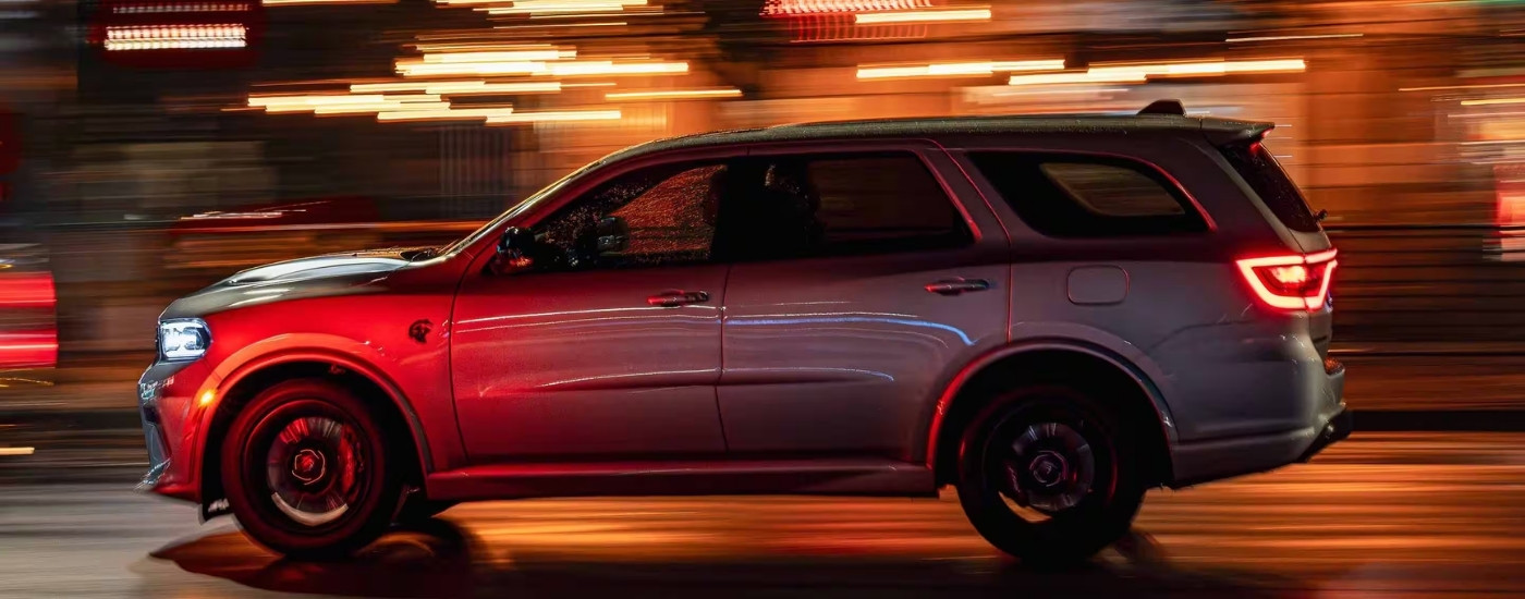 A grey 2025 Dodge Durango from the side.