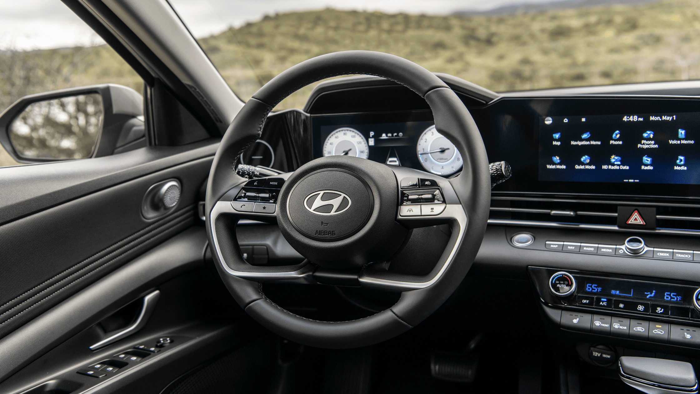 2025 Hyundai Elantra cockpit with digital gauges and touchscreen infotainment system
