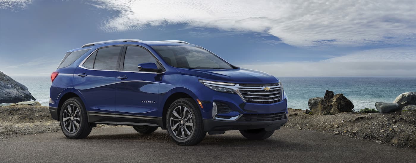A blue 2022 Chevy Equinox from the side.
