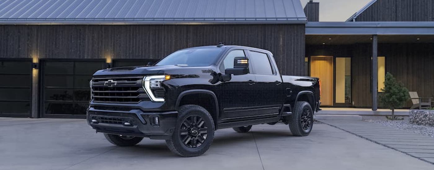 A black 2024 Chevy Silverado 2500 HD from the front.