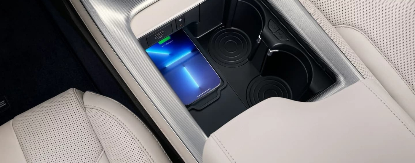 Smartphone in the center console of a 2023 Hyundai Palisade.
