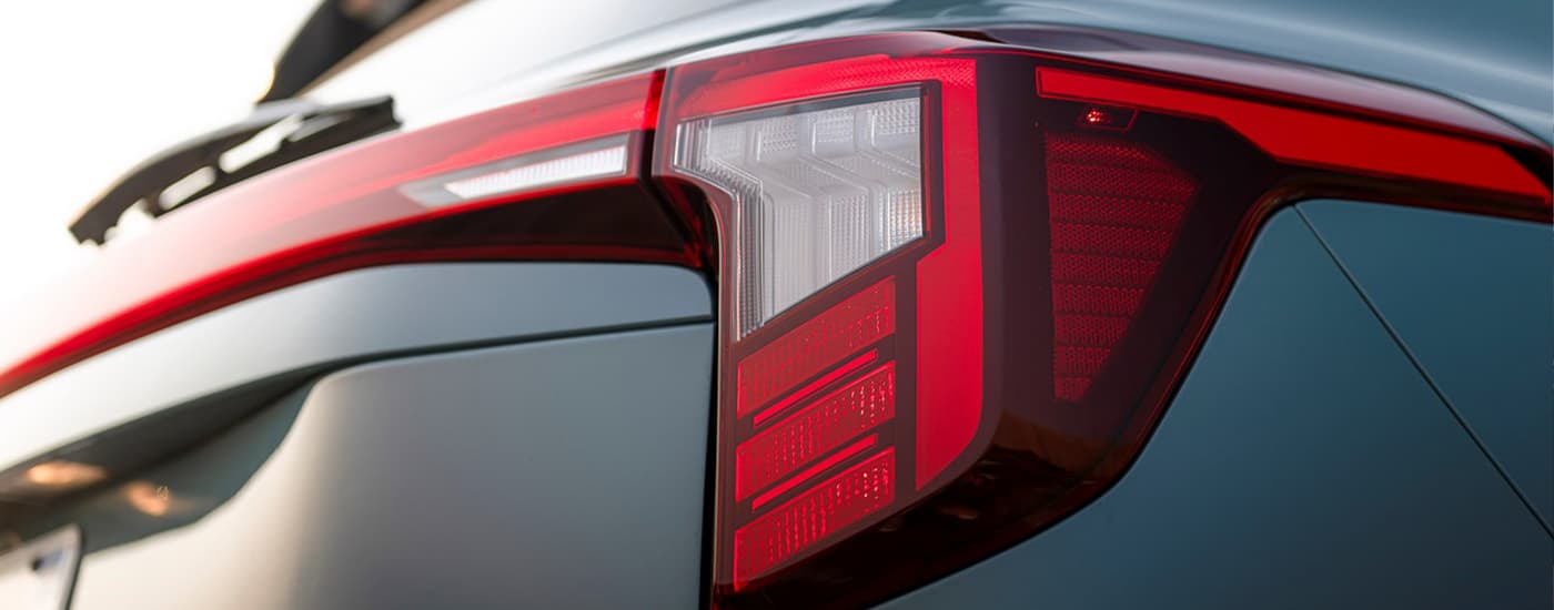 Rear brake light on a blue 2025 Kia Seltos SX.