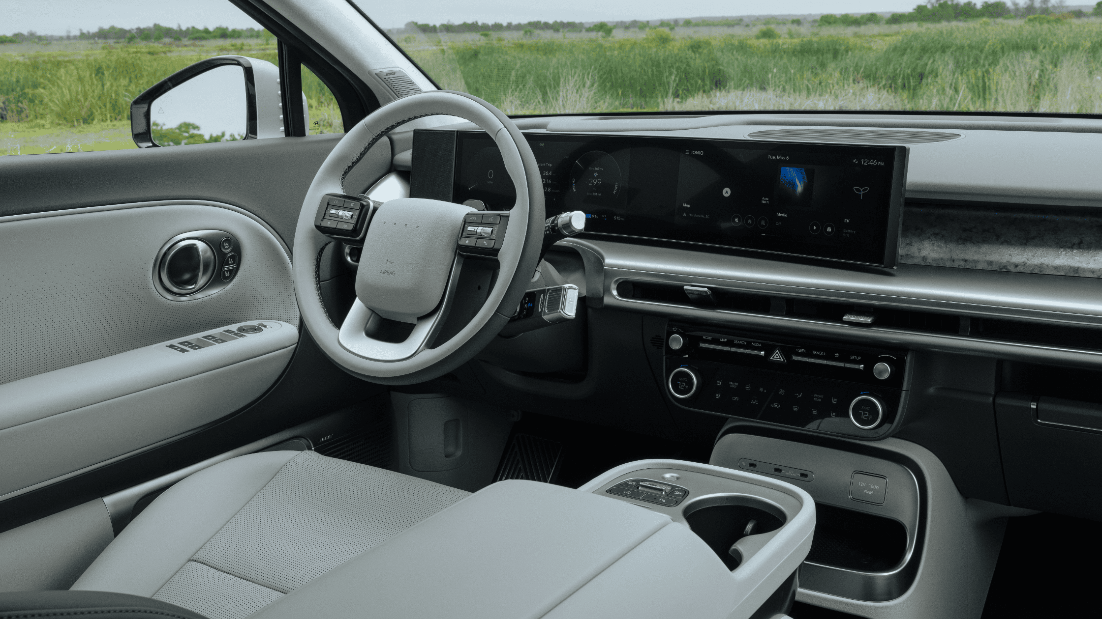 Interior dashboard of the 2026 IONIQ 9 with panoramic screens and touch-sensitive controls.