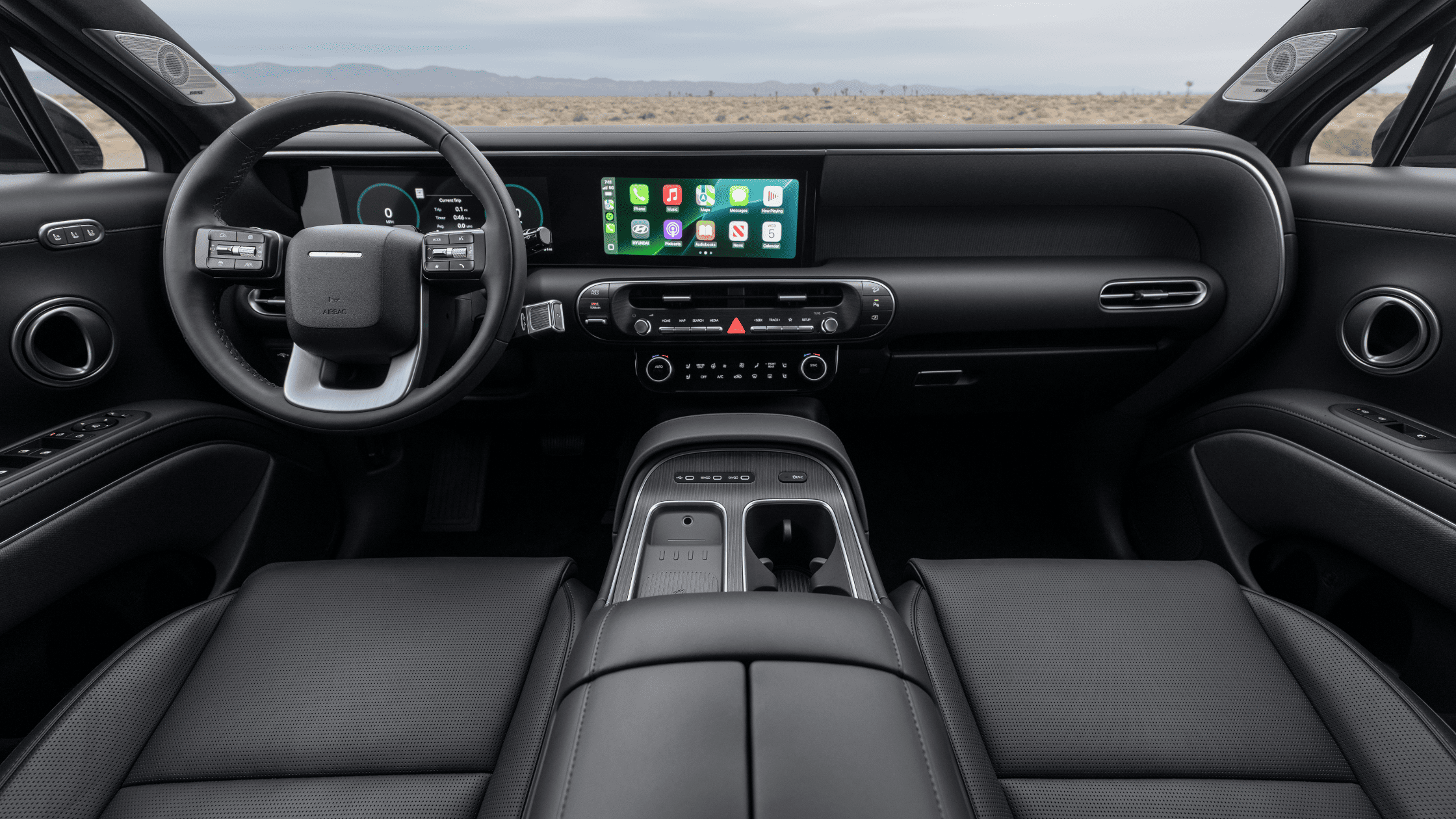 Wide dashboard and touchscreen interface of the 2026 Hyundai Palisade featuring connected tech.