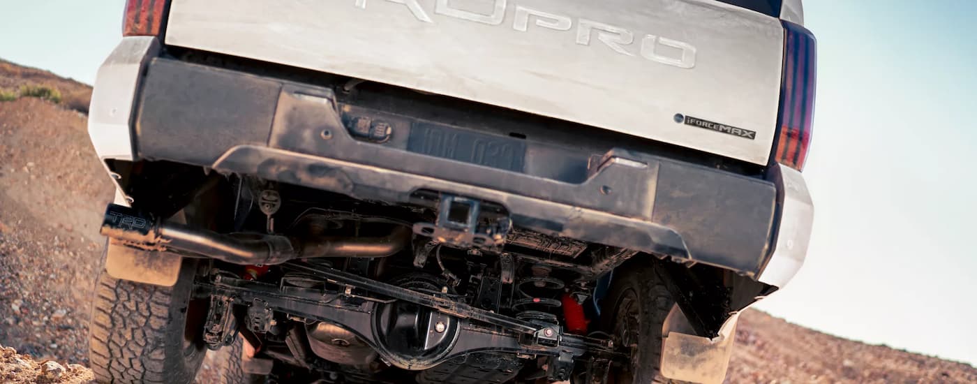 Rear of a white 2025 Toyota Tundra for sale near Canyon Lake off-roading.