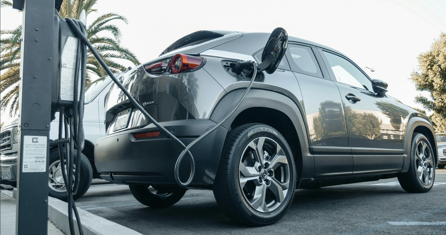 Gray Electric Car Parked on a Charging Bay