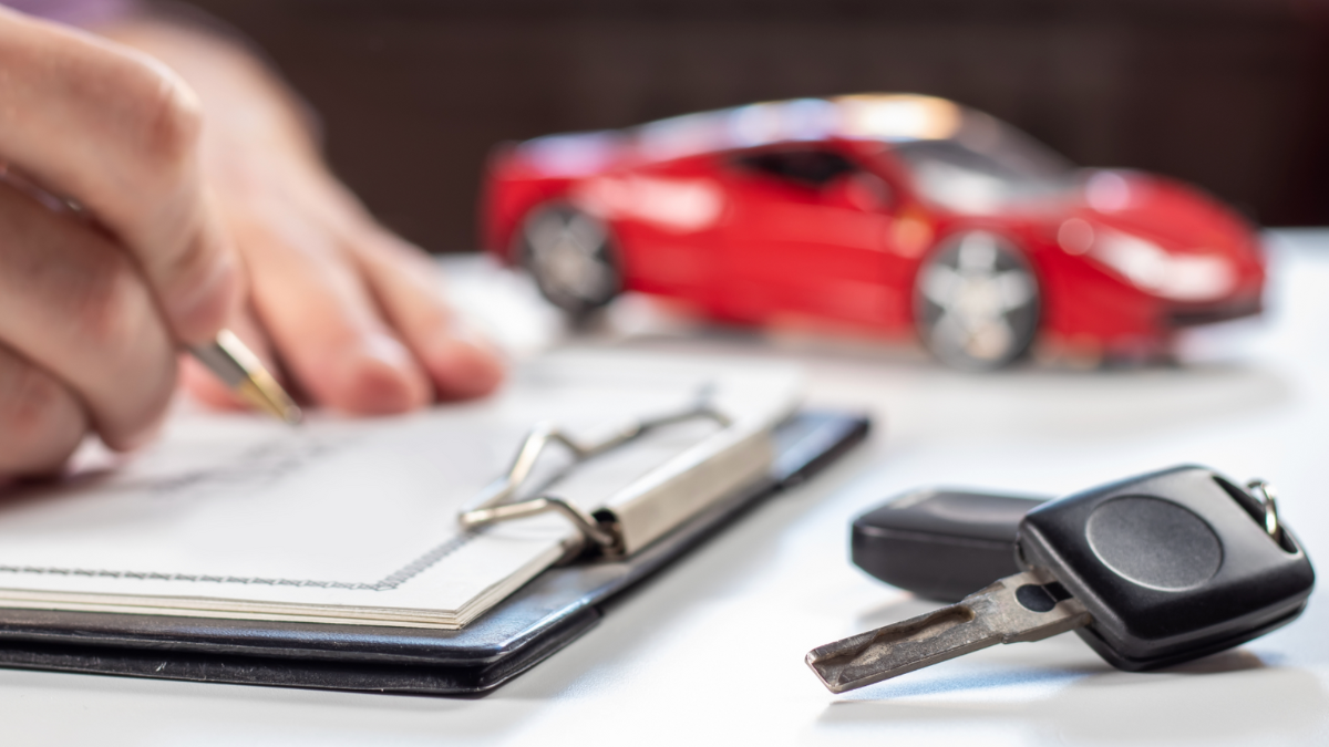 Customer signing paperwork for their next Honda model