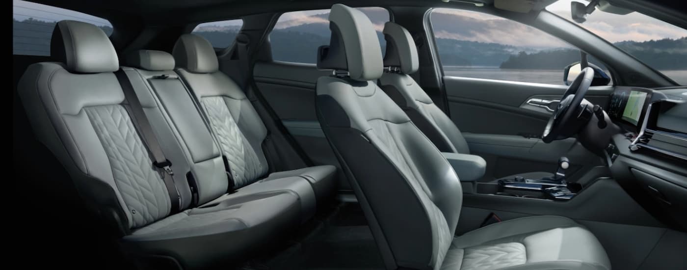 Front and rear seating in a 2025 Kia Sportage at a Kia dealer near Council Bluffs