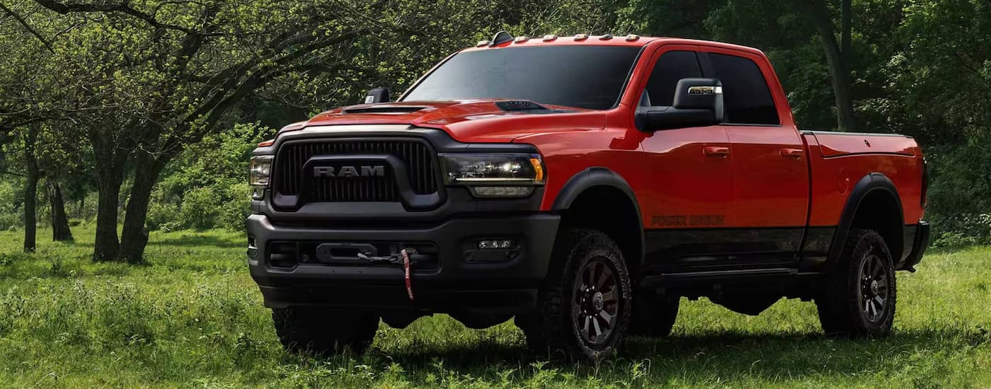 Red 2025 Ram 2500 Power Wagon parked in a field