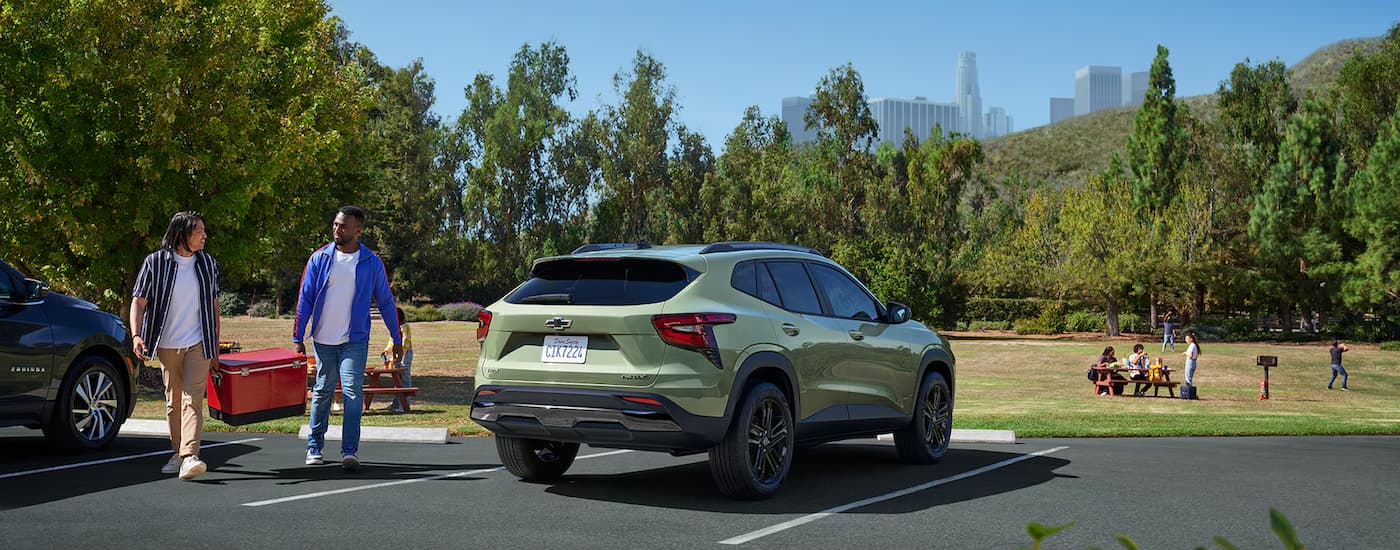 Green 2025 Chevy Trax at a park