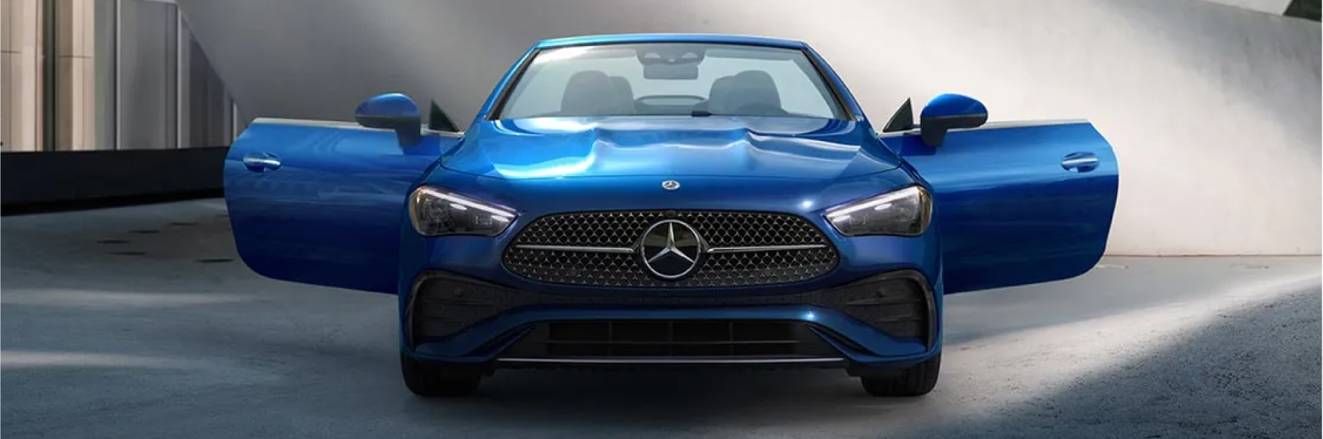 Front of Blue Mercedes-Benz Sedan