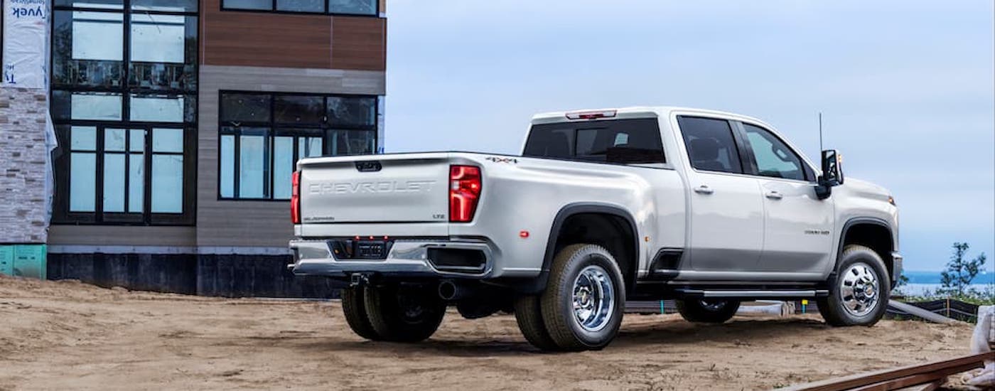 A white 2024 Chevy Silverado 3500 HD from the side.