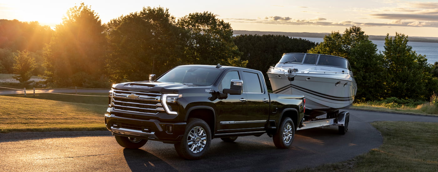 A black 2025 Chevy Silverado 2500 for sale from the front at an angle.