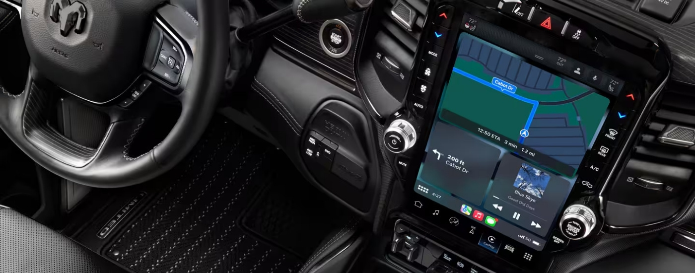 Infotainment screen in a 2024 Ram 2500 at a Ram dealer near Nebraska City.