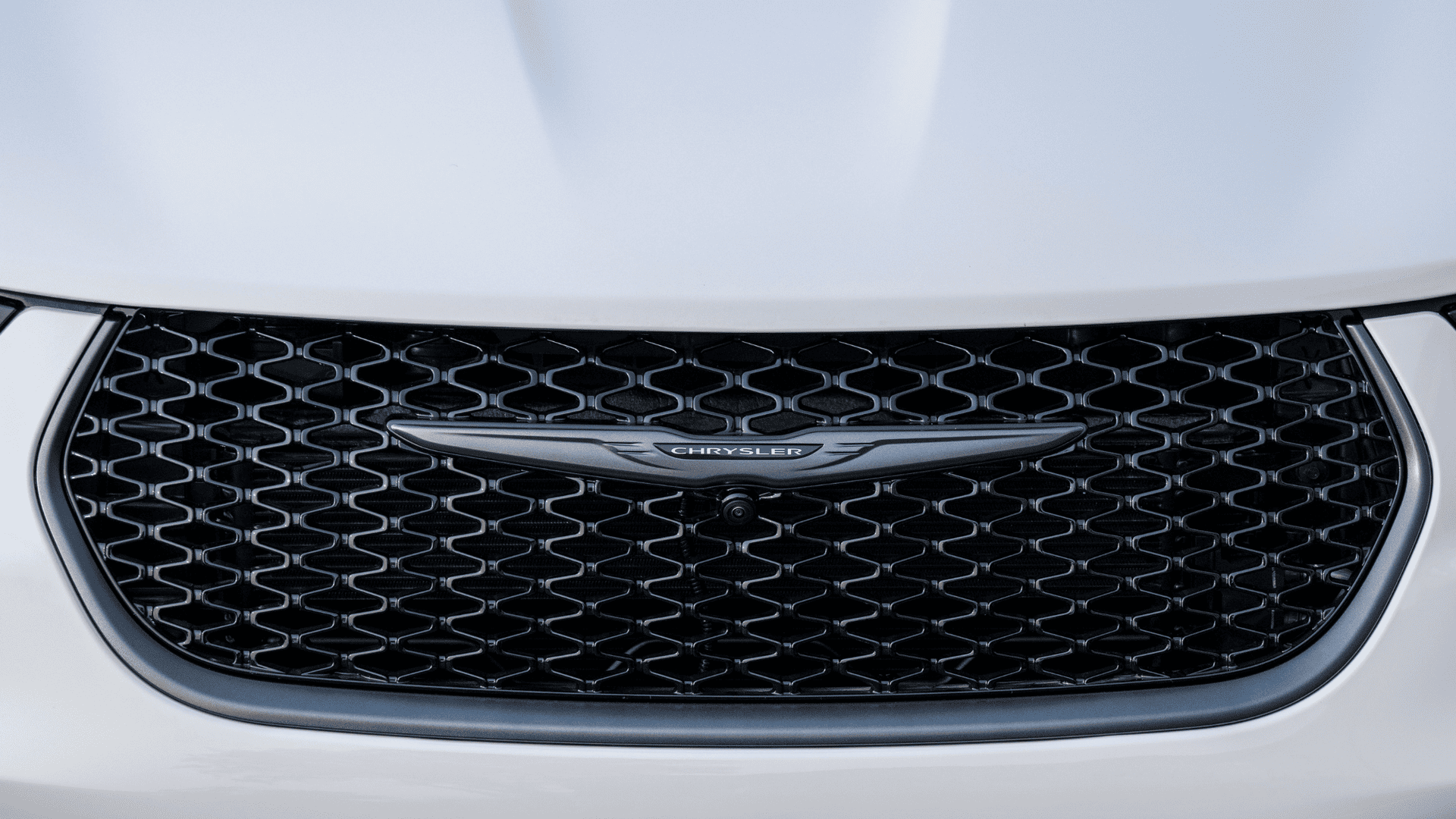 Close-up of the Chrysler grille and front camera on the 2026 Chrysler Pacifica.