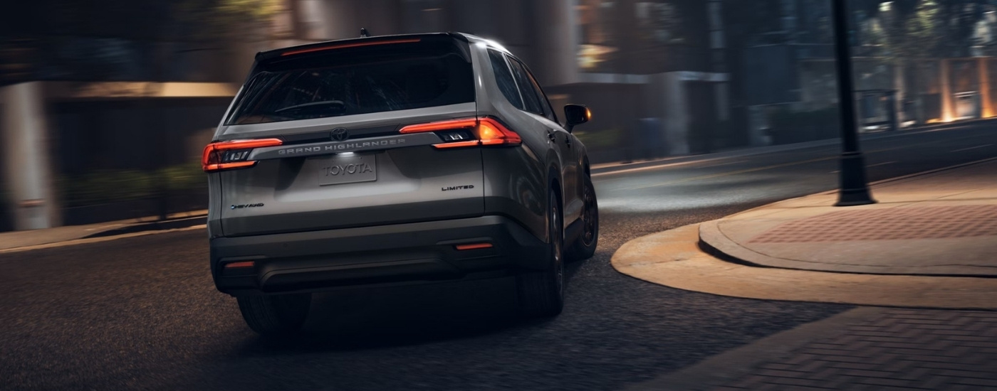 A grey 2025 Toyota Grand Highlander for sale from behind.