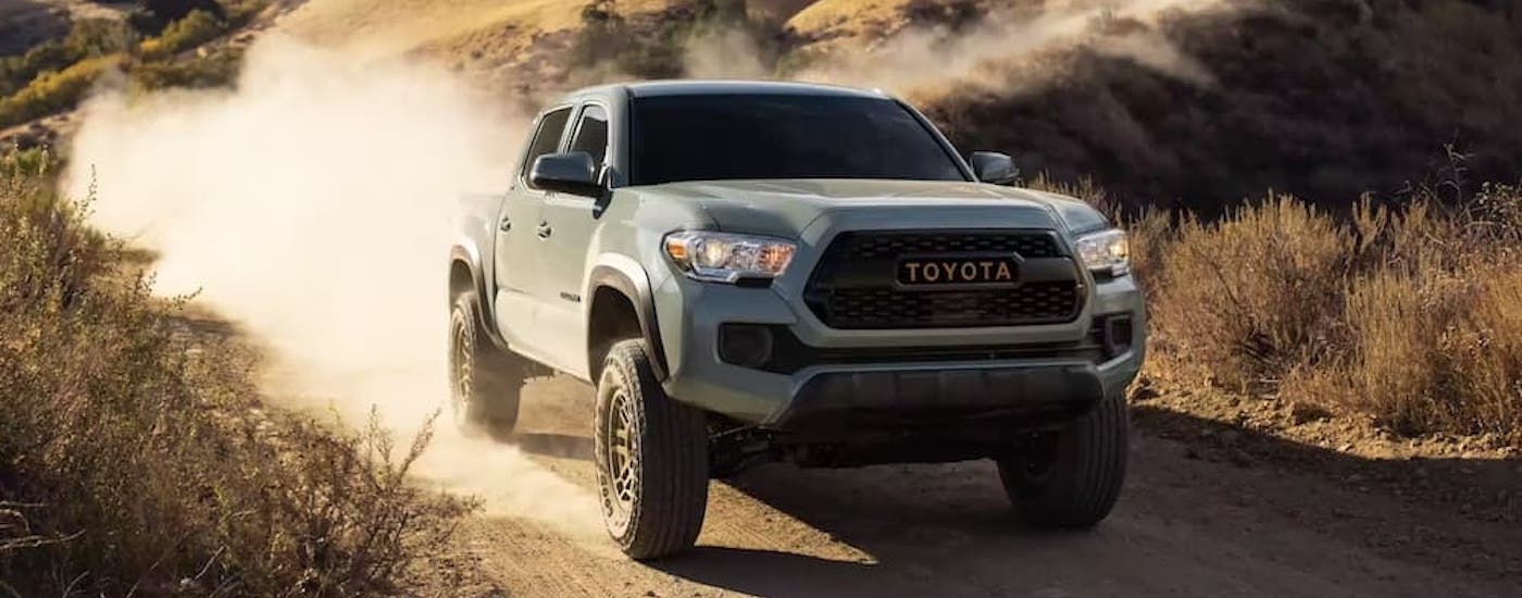 A grey 2022 Toyota Tacoma from the front at an angle.