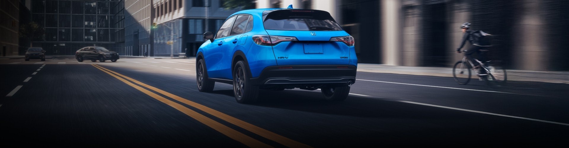 2026 Honda HR-V driving down a city road