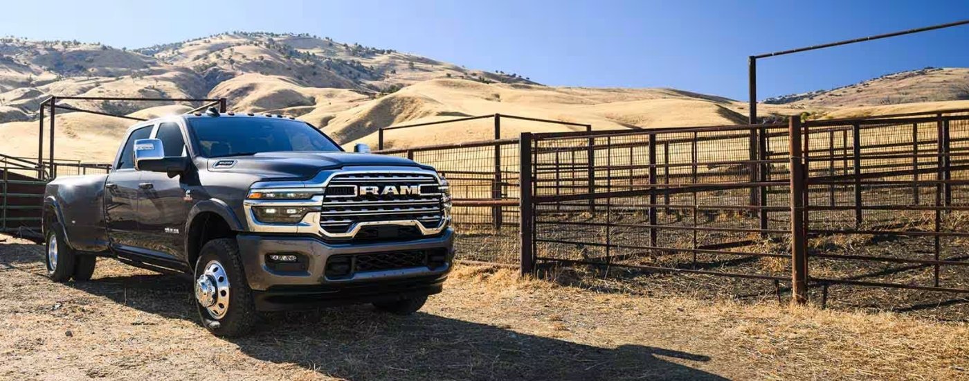 A grey 2025 Ram 3500 for sale from the front at an angle.