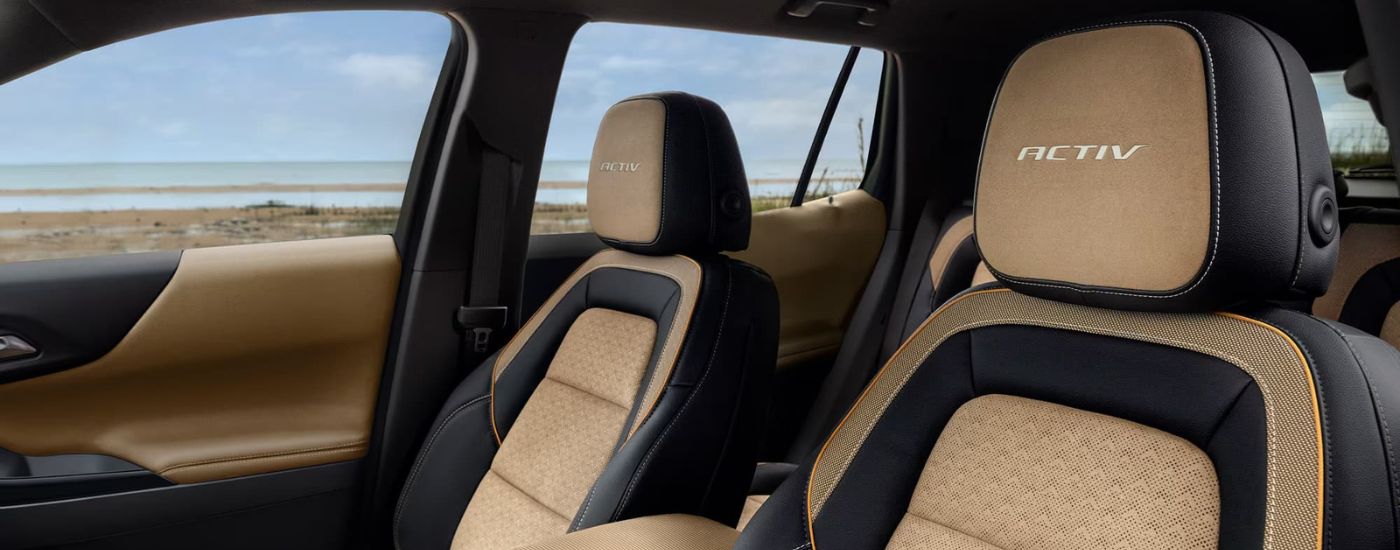 Black and tan leather seating in a 2025 Chevy Equinox ACTIV for sale near Gretna