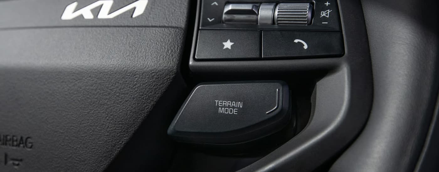 Steering wheel buttons in a 2026 Kia Sportage
