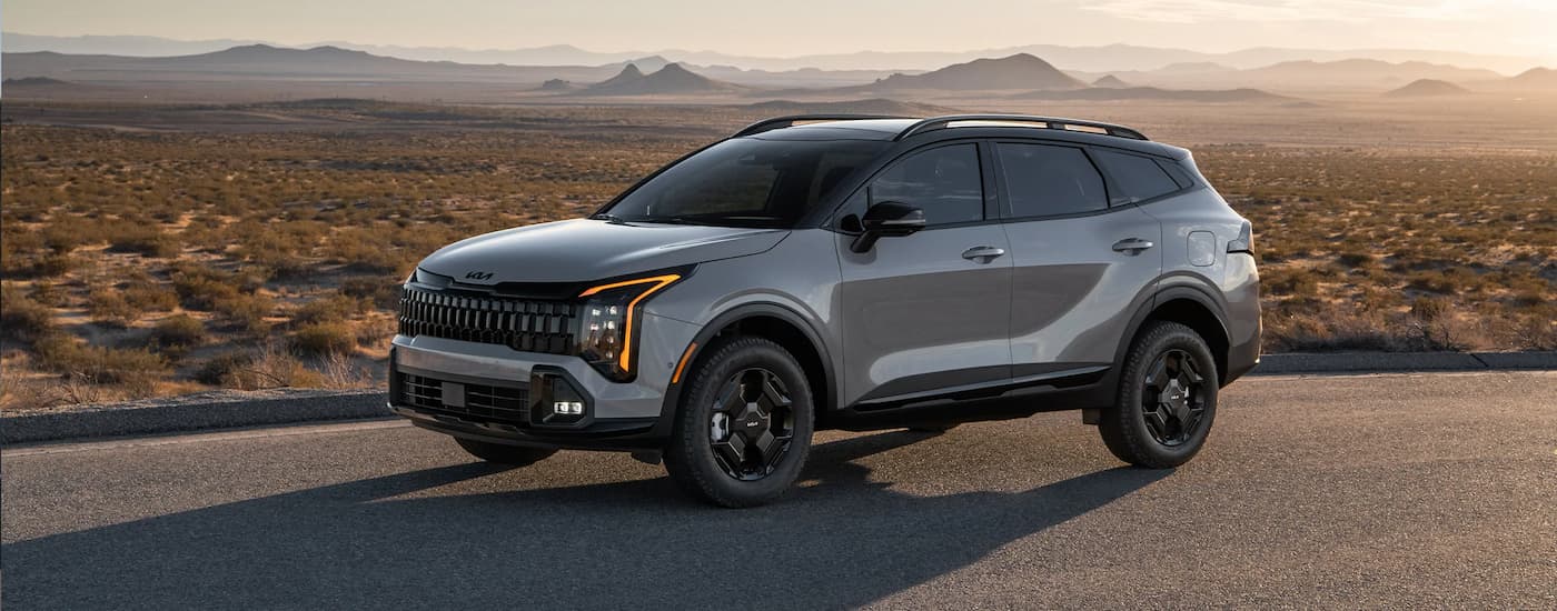 Grey 2026 Kia Sportage for sale near Sioux City parked near an open area 