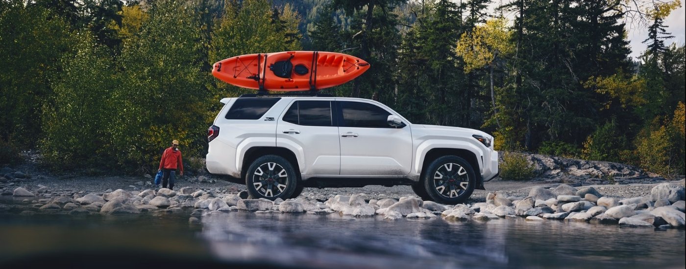 A white 2025 Toyota 4Runner for sale near New Braunfels on a lakeshore