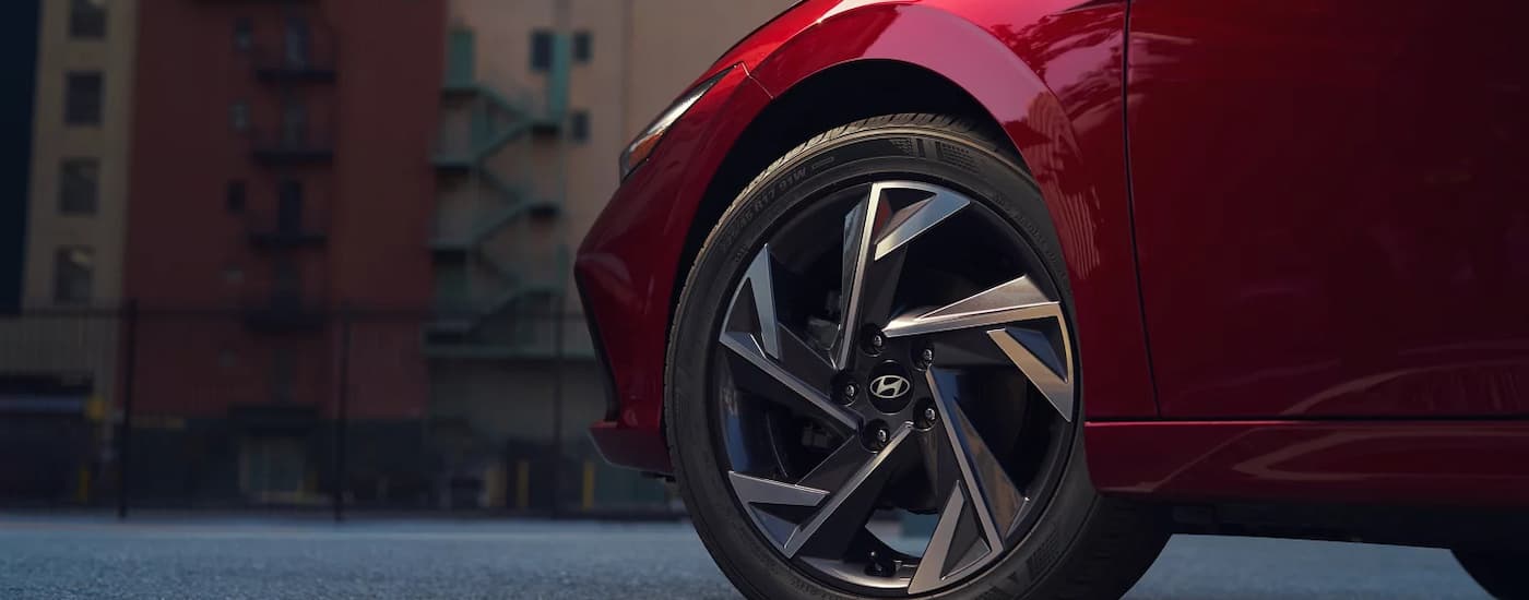 Side and tire on a red 2025 Hyundai Elantra for sale near Pearland