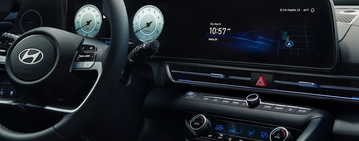 Steering wheel and infotainment screen in a 2025 Hyundai Elantra