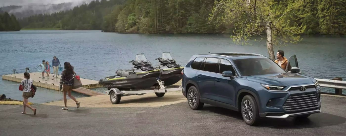 Blue 2024 Toyota Grand Highlander for sale near New Braunfels towing jetskis