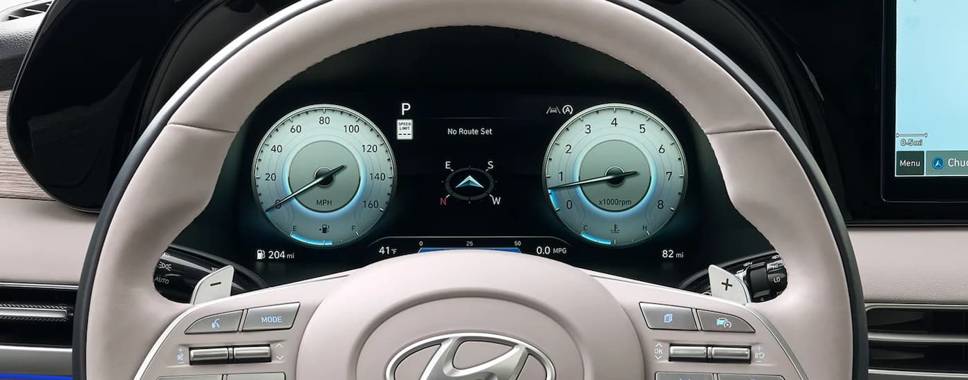 Steering wheel and digital cluster in a 2025 Hyundai Palisade for sale near Manvel