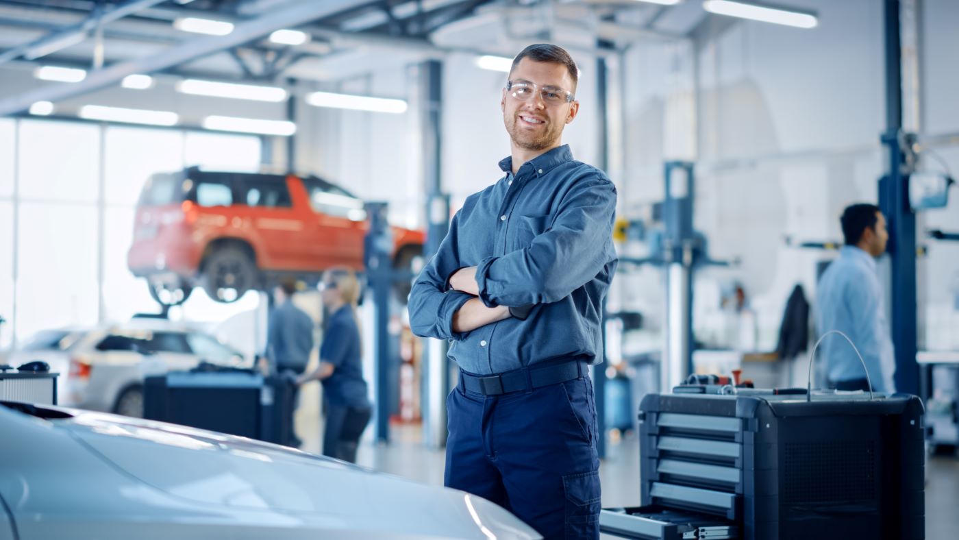 Technician smiling in Service Center