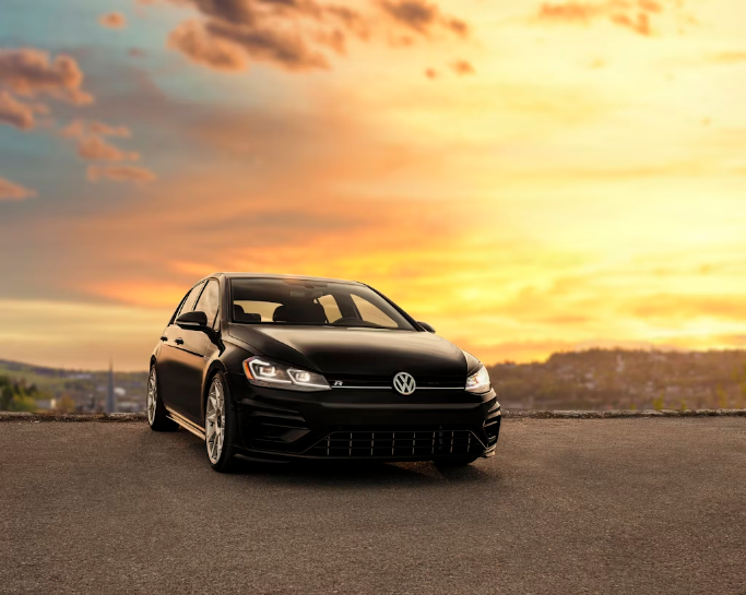 black mercedes benz c class on gray asphalt road during sunset
