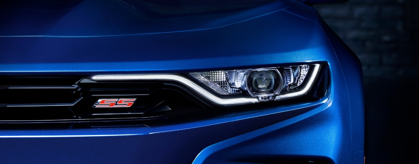 A blue 2025 Chevy Camaro SS from the front.