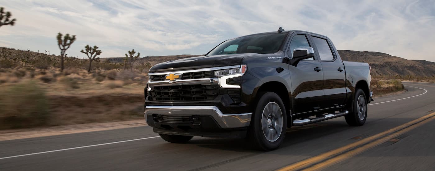 A black 2022 Chevy Silverado 1500 from the front at an angle.